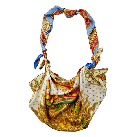 hermes bag with scarf.